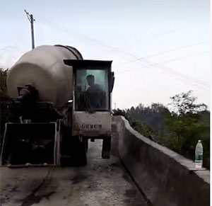 self loading concrete mixer machine in mountain area.jpg